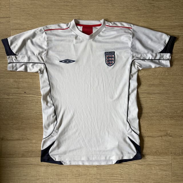 Illustration of the Umbro England White Training Shirt 2000s shirt